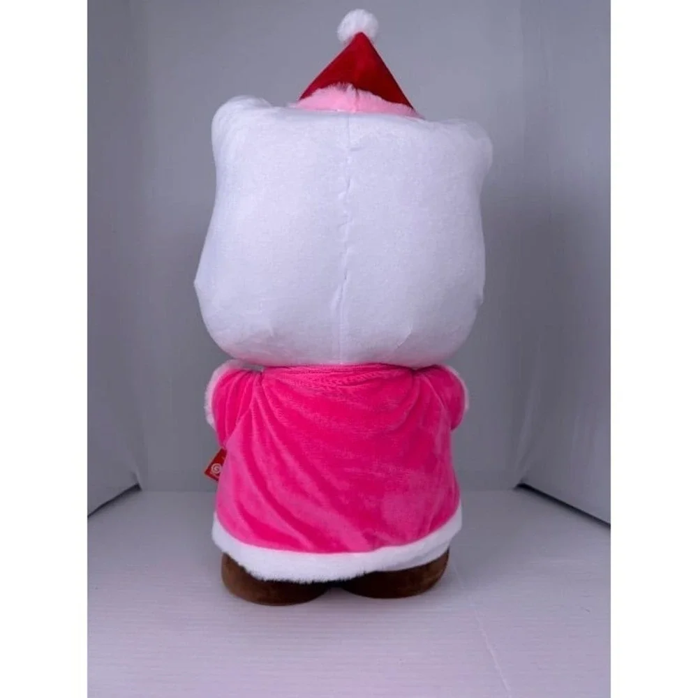 NWT -‎ Hello Kitty holding Gingerbread Cookie Christmas Greeter-CVS 2025